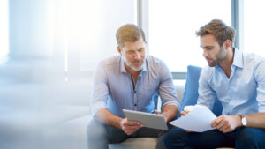 An employment lawyer in Hartford discussing legal options with their client.