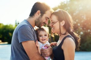 Working parents enjoy time off work with their baby. A lawyer explained to them what PFML and FMLA are in Massachusetts.